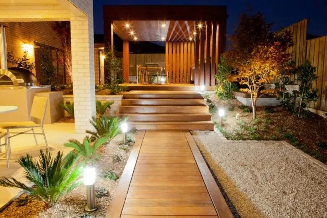 Backyard patio with wired lighting